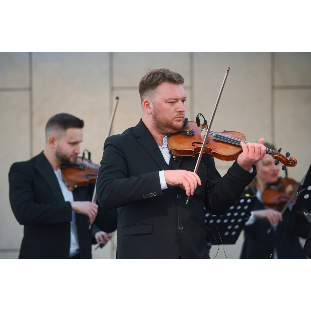 Фото №10 - Афіша Афіша КІНОМУЗИКА НА ДАХУ – Kyiv Mozart Orchestra, Київ - 2026-05-23 19:00:00