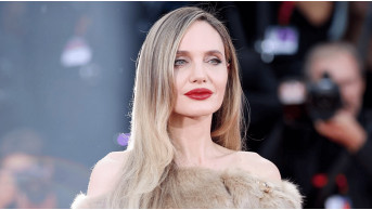 Angelina Jolie shines at the Venice Film Festival in a Saint Laurent dress