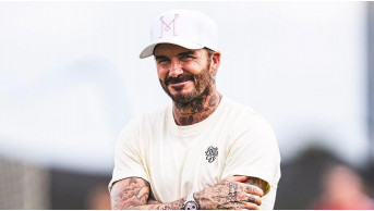 David Beckham impresses with his fit physique and fashion tips from Victoria