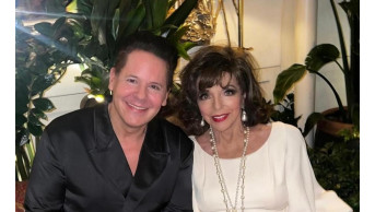Joan Collins sets London on fire: ''Dynasty'' star in wedding dress at Christmas party
