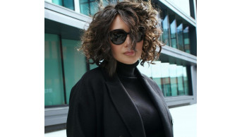 Olena Mozgova's Stunning Black Gown: A Fashion Statement with a Twist