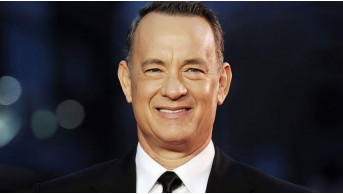 Elizabeth Hanks Unveils the Shadows of Her Childhood with Tom Hanks