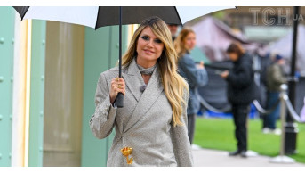 Heidi Klum Shines in Golden Rose Ensemble on German Reality Show