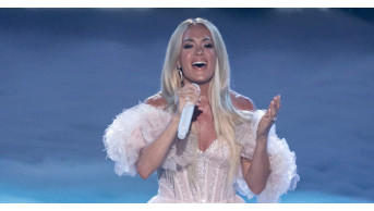 Carrie Underwood Stuns in Ethereal OKSANA MUKHA Gown at Easter American Idol Performance