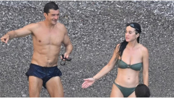 Katy Perry almost lost her bikini in the sea while vacationing with Orlando Bloom
