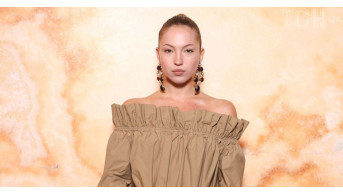 Lila Moss Stuns in Beige Mini-Dress at Saint Laurent's Paris Fashion Show