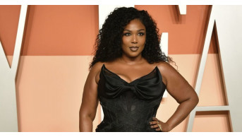 Lizzo Dazzles in Atelier Versace: A Night of Elegance and Transformation