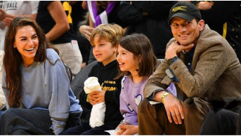 Hollywood Stars Mila Kunis and Ashton Kutcher Enjoy Family Time at Basketball Game