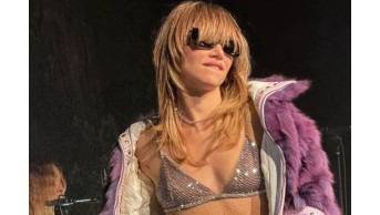 Suki Waterhouse Stuns in Ukrainian Silk at Her Latest Concert