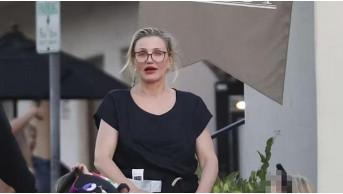 Family idyll: Cameron Diaz shopping with her husband and children in Montecito