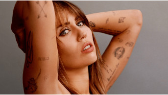 Singer Miley Cyrus is again being chased by a fan with a scandalous toy