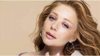 Tina Karol's Jaw-Dropping Transformation: From Curves to Toned Abs