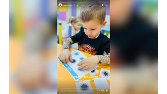 Victor Pavlik's Bold Fashion Choice: A Tattooed Toddler in Biker Chic